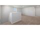 Upstairs hallway with carpeted stairs and neutral walls at 68 Cape Point Dr., Conway, SC 29527