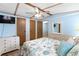 Bedroom showcases nautical décor, two closets, TV, and ensuite bath access at 6001-Mh107 S Kings Hwy., Myrtle Beach, SC 29575