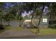 Charming home with lush trees, fenced yard, garage, driveway, and wooden deck at 6001-Mh107 S Kings Hwy., Myrtle Beach, SC 29575