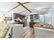 Charming eat-in kitchen featuring stainless steel appliances, wood cabinets, and a view to the laundry room at 6001-Mh107 S Kings Hwy., Myrtle Beach, SC 29575
