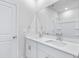 Bathroom featuring a double vanity, a large mirror, and plenty of storage at 7004 Watercress St, Myrtle Beach, SC 29579