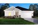 Charming single-Gathering home featuring stone accents, a two-car garage, and a well-manicured lawn at 7004 Watercress St, Myrtle Beach, SC 29579