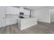 Bright kitchen featuring white cabinets and stainless steel appliances and an open layout at 7004 Watercress St, Myrtle Beach, SC 29579