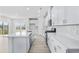 Bright and spacious kitchen features stainless appliances, white cabinets and an open layout at 7004 Watercress St, Myrtle Beach, SC 29579
