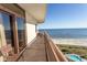 Spacious balcony overlooking the ocean, beach, and pool area at 100 North Beach Blvd. # 1819, North Myrtle Beach, SC 29582