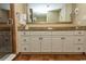 Bathroom with granite countertop, double sinks, and walk-in shower at 100 North Beach Blvd. # 1819, North Myrtle Beach, SC 29582