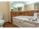 Bathroom with large garden tub and brown tile at 100 North Beach Blvd. # 1819, North Myrtle Beach, SC 29582