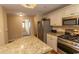 Granite and stainless steel kitchen with an island at 100 North Beach Blvd. # 1819, North Myrtle Beach, SC 29582