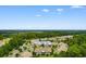 Aerial view of community, highlighting lush trees and 1137 Peace Pipe Pl condos at 1137 Peace Pipe Ln. # 201, Myrtle Beach, SC 29579