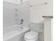 Clean bathroom featuring a white tub, toilet, and a shower, with a towel rack at 1137 Peace Pipe Ln. # 201, Myrtle Beach, SC 29579