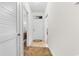 Hallway view with closet, front door, carpet and tile flooring at 1137 Peace Pipe Ln. # 201, Myrtle Beach, SC 29579