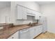 Bright kitchen featuring white appliances, cabinets, and countertops at 1137 Peace Pipe Ln. # 201, Myrtle Beach, SC 29579