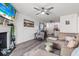 Open concept living area with modern furnishings and cozy fireplace feature at 3015 Old Bryan Dr. # 13-1, Myrtle Beach, SC 29577