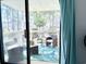Relaxing covered porch with comfortable seating and a view of the surrounding lush greenery at 3015 Old Bryan Dr. # 13-1, Myrtle Beach, SC 29577