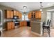 Kitchen with wood cabinets, stainless steel appliances, and an island at 109 Pheasant Run Dr., Murrells Inlet, SC 29576