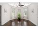 Bright sunroom with hardwood floors,plant, and a skylight at 109 Pheasant Run Dr., Murrells Inlet, SC 29576