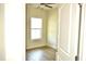 Bright bedroom with a window, ceiling fan and hardwood floors at 110 Hallandale Lane # Left, Murrells Inlet, SC 29576