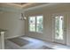 Dining room with hardwood floors, chandelier and access to a deck at 110 Hallandale Lane # Left, Murrells Inlet, SC 29576