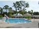 Community pool with lounge chairs and lift access at 110 Hallandale Lane # Left, Murrells Inlet, SC 29576