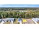New home construction offers serene views of a wooded area and pond at 385 Sun Colony Blvd., Longs, SC 29568