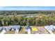 New home construction offers serene views of a wooded area and pond at 385 Sun Colony Blvd., Longs, SC 29568