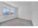 Bright bedroom features plush carpeting and large windows at 385 Sun Colony Blvd., Longs, SC 29568