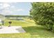 Enjoy the picturesque lake views from this backyard, complete with a grill for outdoor gatherings at 340 Walden Lake Rd., Conway, SC 29526