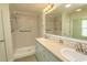 Bright bathroom with a step-in shower, grab bars, and double sink vanity at 340 Walden Lake Rd., Conway, SC 29526