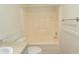 Full bathroom with a shower and tub combo featuring white tiled walls at 340 Walden Lake Rd., Conway, SC 29526