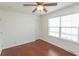 This bedroom offers natural light and wood flooring at 340 Walden Lake Rd., Conway, SC 29526
