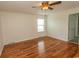 This cozy bedroom features hardwood floors and a window for natural light at 340 Walden Lake Rd., Conway, SC 29526