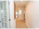 Bright hallway with tiled flooring, leading to an open living space with lots of natural light at 340 Walden Lake Rd., Conway, SC 29526