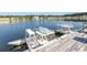 Picturesque lake view with a paddleboat dock and fountain, perfect for tranquil moments and recreation at 340 Walden Lake Rd., Conway, SC 29526
