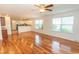 Bright living room features hardwood floors and a seamless transition to the kitchen at 340 Walden Lake Rd., Conway, SC 29526