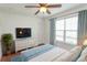 Bedroom with a king-size bed, hardwood flooring, window, and white dresser at 340 Walden Lake Rd., Conway, SC 29526