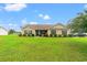 Charming single-story home with well-manicured lawn and inviting curb appeal at 719 American Beech St., Loris, SC 29569