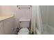 Clean bathroom featuring a toilet, bathtub with shower curtain, and vanity at 202 70Th Ave. N # 104, Myrtle Beach, SC 29572