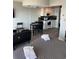 Studio apartment with a well-equipped kitchen and a cozy sleeping area at 202 70Th Ave. N # 104, Myrtle Beach, SC 29572