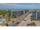 Aerial view showing condo building, parking lot, and ocean at 5905 South Kings Hwy. # A450, Myrtle Beach, SC 29575