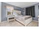 Cozy bedroom with a comfortable bed and nightstand at 5905 South Kings Hwy. # A450, Myrtle Beach, SC 29575
