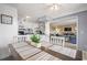 Bright dining area with table and chairs, offering a view into the living room at 5905 South Kings Hwy. # A450, Myrtle Beach, SC 29575