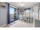 Bright dining area with table and chairs near balcony at 5905 South Kings Hwy. # A450, Myrtle Beach, SC 29575