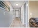 Bright condo hallway featuring tiled floor and neutral walls at 5905 South Kings Hwy. # A450, Myrtle Beach, SC 29575