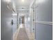 Clean condo hallway with light walls and tiled floor at 5905 South Kings Hwy. # A450, Myrtle Beach, SC 29575