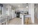 Well-equipped kitchen featuring white cabinets, granite counters, and black appliances at 5905 South Kings Hwy. # A450, Myrtle Beach, SC 29575