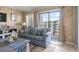 Living room with balcony access and ocean view at 5905 South Kings Hwy. # A450, Myrtle Beach, SC 29575
