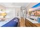 Bedroom with wood floors, TV, dresser and doorway to hallway at 1296 Foxtail Dr., Longs, SC 29568