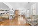 Expansive living room with hardwood floors, neutral walls, and comfortable seating arrangement at 1296 Foxtail Dr., Longs, SC 29568