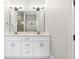 Bathroom featuring double sinks, marble floors, and a glass enclosed shower at 205 Waterfall Circle, Little River, SC 29566