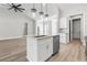 Kitchen features a large island, stainless steel appliances, and an open concept layout at 205 Waterfall Circle, Little River, SC 29566